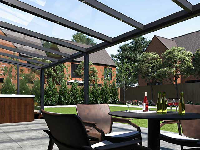 Stylish black canopies shading modern outdoor furniture in pristine garden