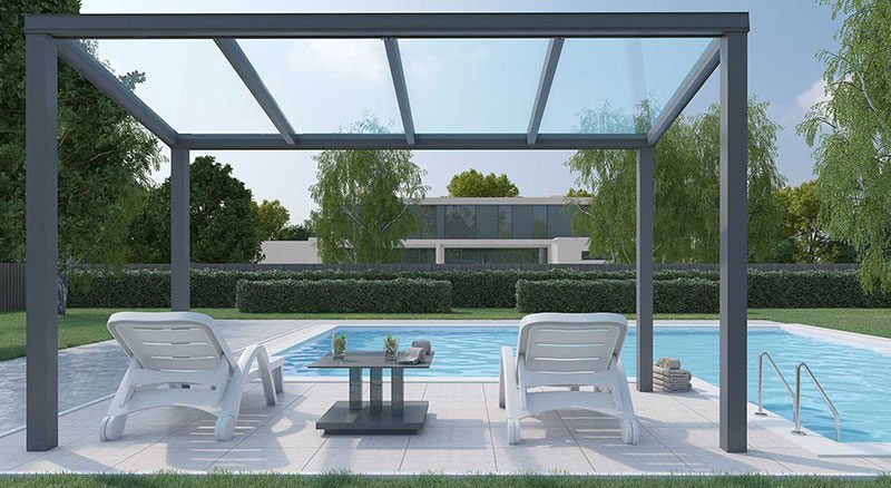 Canopies providing shade and relaxation next to a sparkling swimming pool in a luxurious outdoor setting